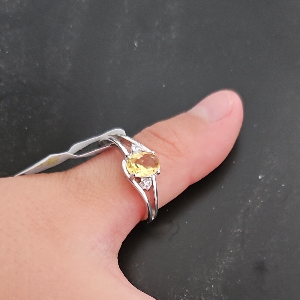 Elegant Silver Ring with Yellow Gemstone